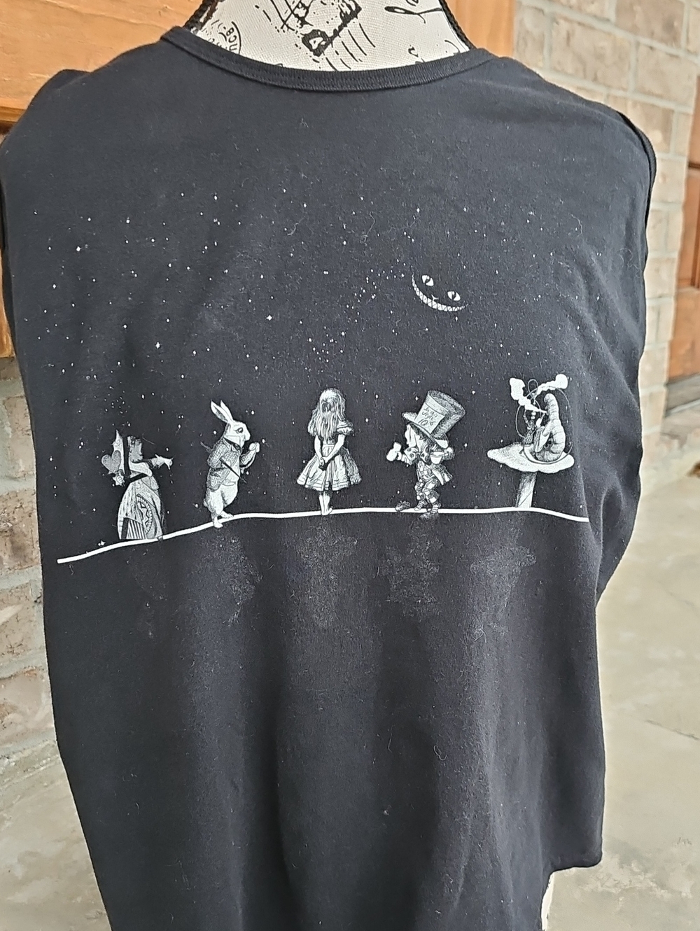 Black Graphic Tee with Alice in Wonderland Characters